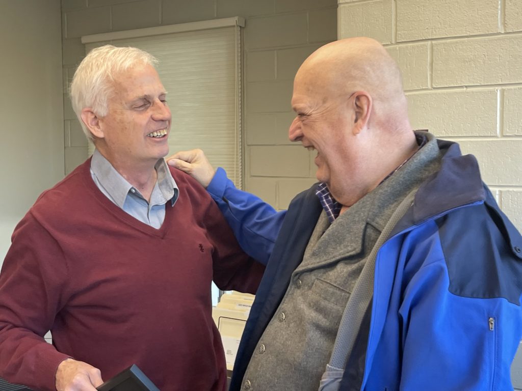 Roger Gravgaard and Bill Dutcher share a laugh.